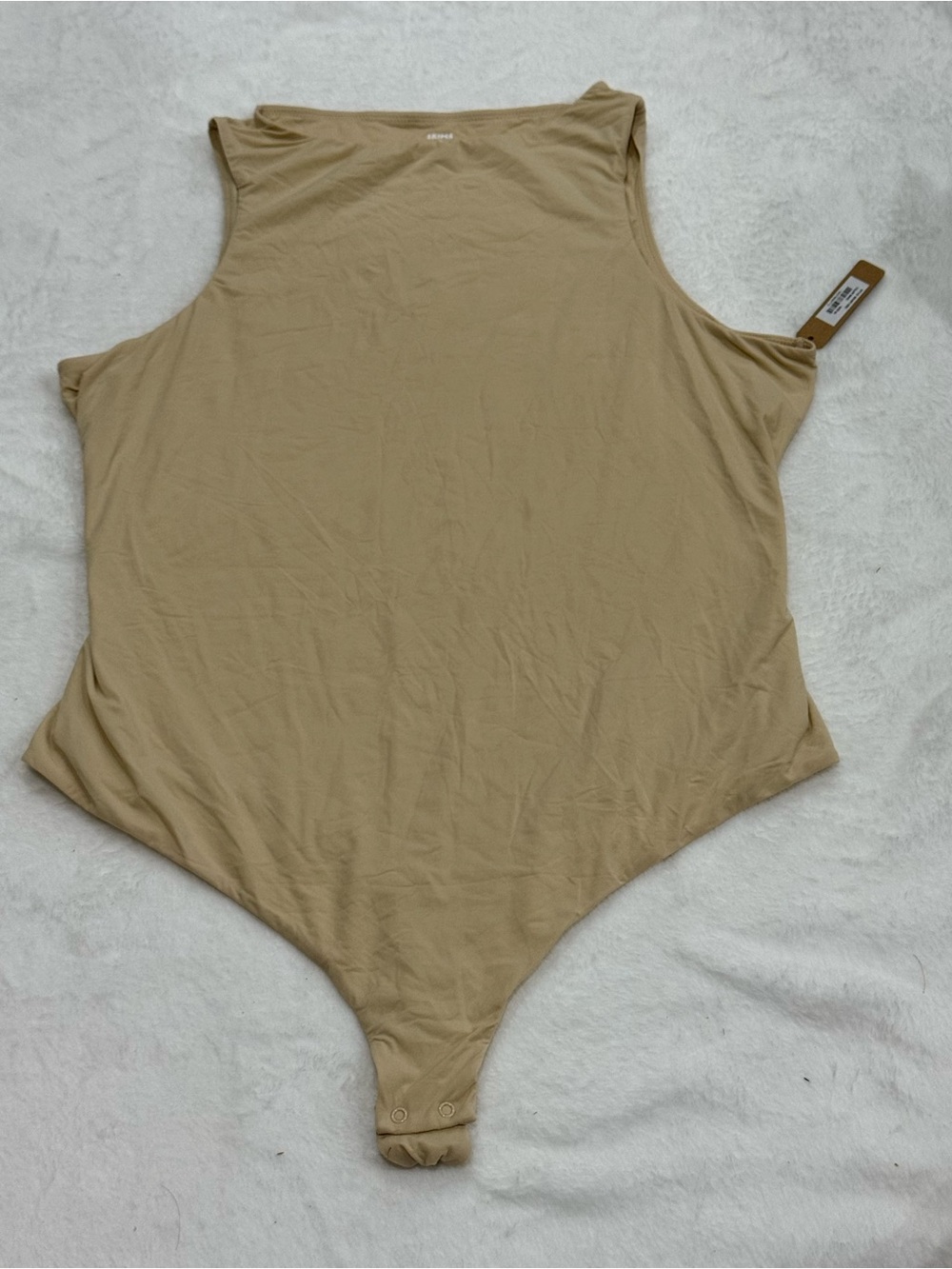 SKIMS  One-Piece Bodysuit in Tan